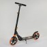Самокат двухколесный Best Scooter 300681 складной с амортизатором. Черный с оранжевым