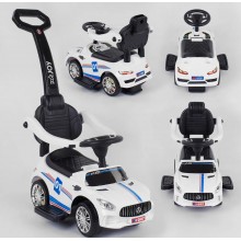 Каталка JOY 33002 Толокар 2 в 1 з батьківською ручкою Багажник Музичний кермо.