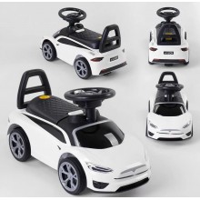 Дитяча каталка JOY TS 50909 Толокар Tesla музичне кермо Багажник Білий